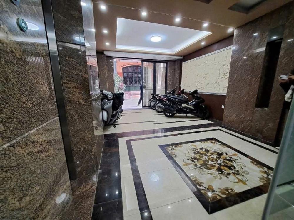 Bán nhà Hoàng Cầu - Đống Đa: 61m2 x 7 tầng, mặt tiền, giá 23.88 tỷ