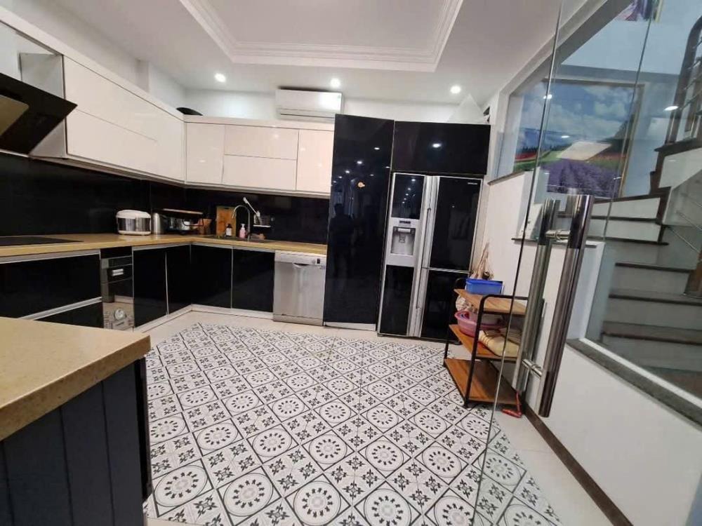 Bán nhà Hoàng Cầu - Đống Đa: 61m2 x 7 tầng, mặt tiền, giá 23.88 tỷ