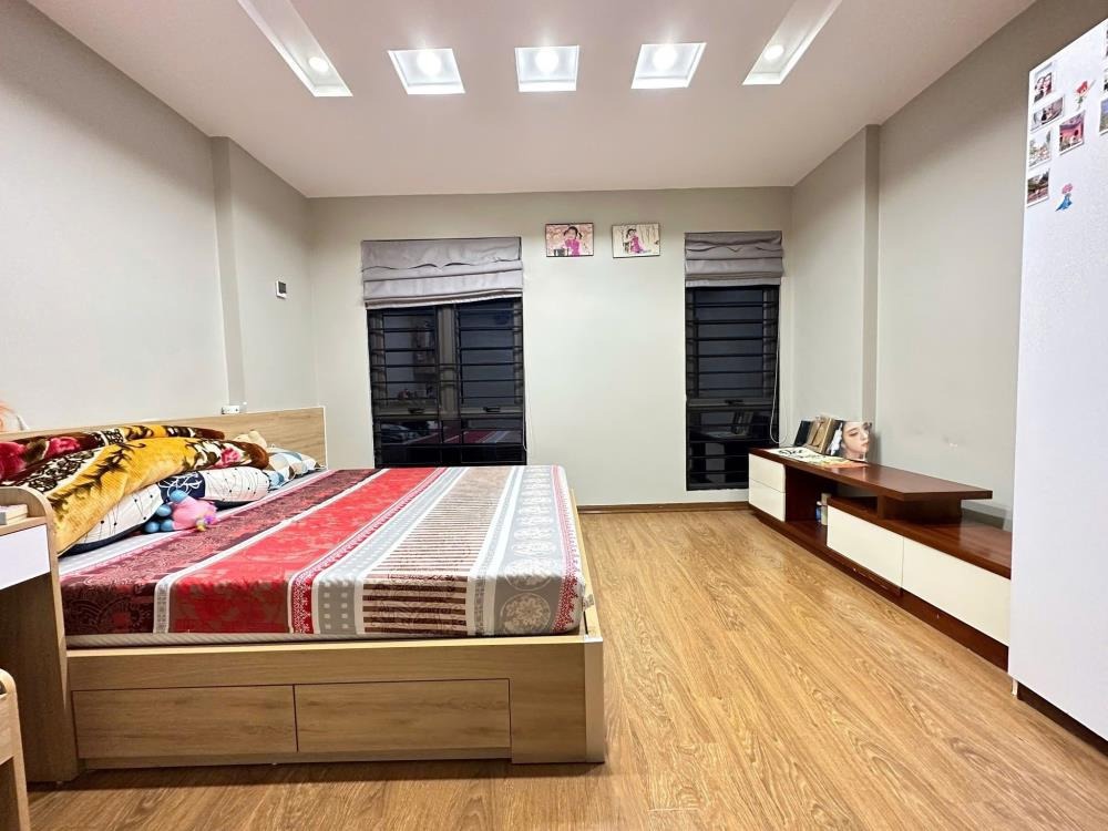 Nhà 6 Tầng 55m² Giáp Nhất - Giá 8.9 Tỷ - Ô Tô Đỗ Cửa