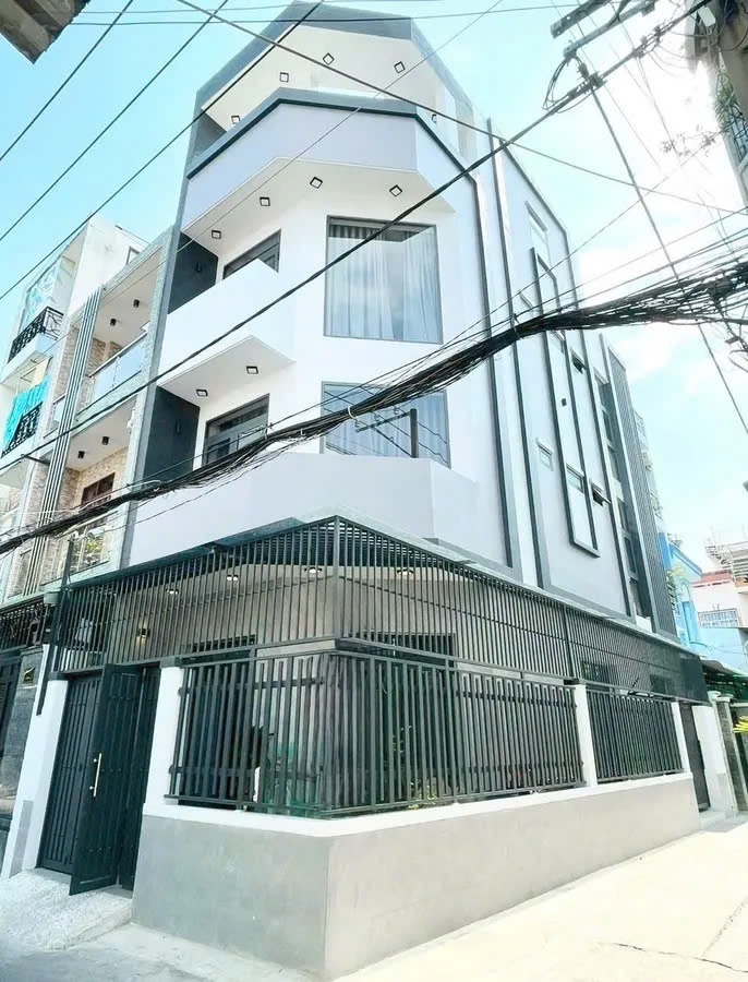 Nhà 4 Tầng Tân Phú: 65m2, Hẻm 8m, Giá 10.2 Tỷ - An Cư Lý Tưởng
