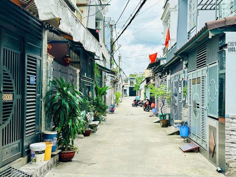 Bán Nhà Phường Hiệp Thành Quận 12 - 4x15, 4 Tầng, Hẻm Xe Hơi - 5.9 Tỷ