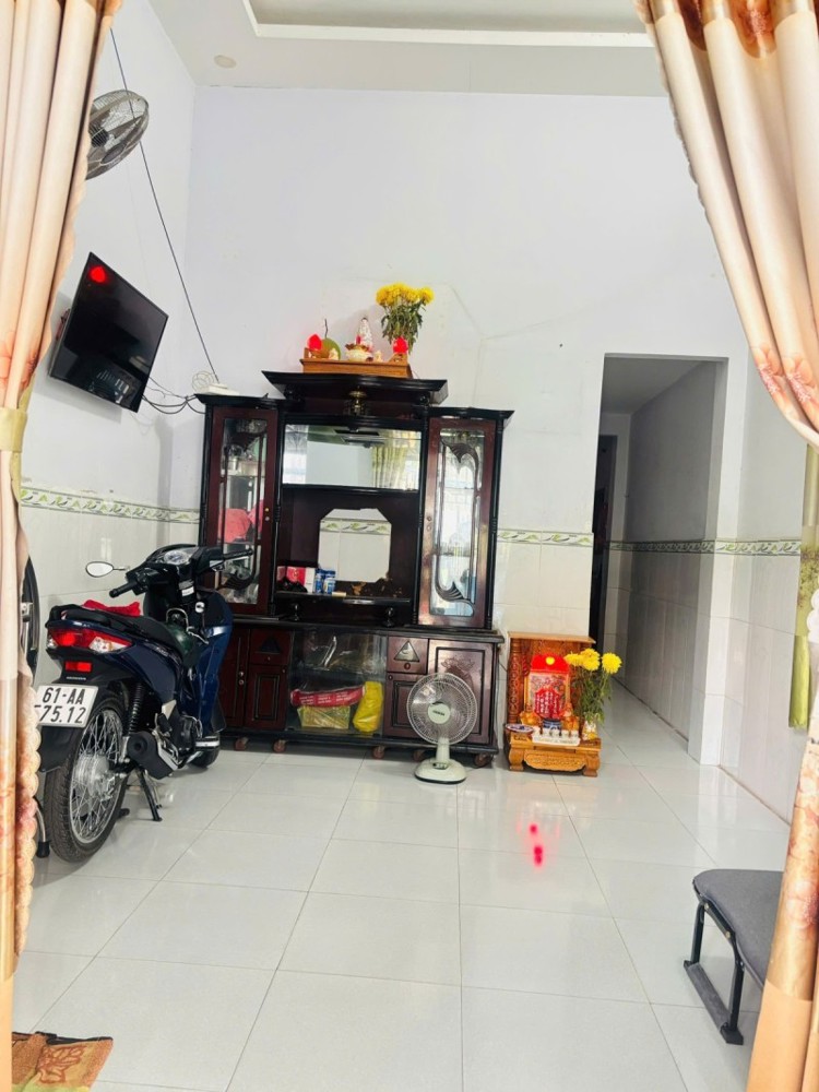 Bán nhà 99m2 Dĩ An,SHR đường xe hơi,gần chợ đêm Biconsi,giá rẻ