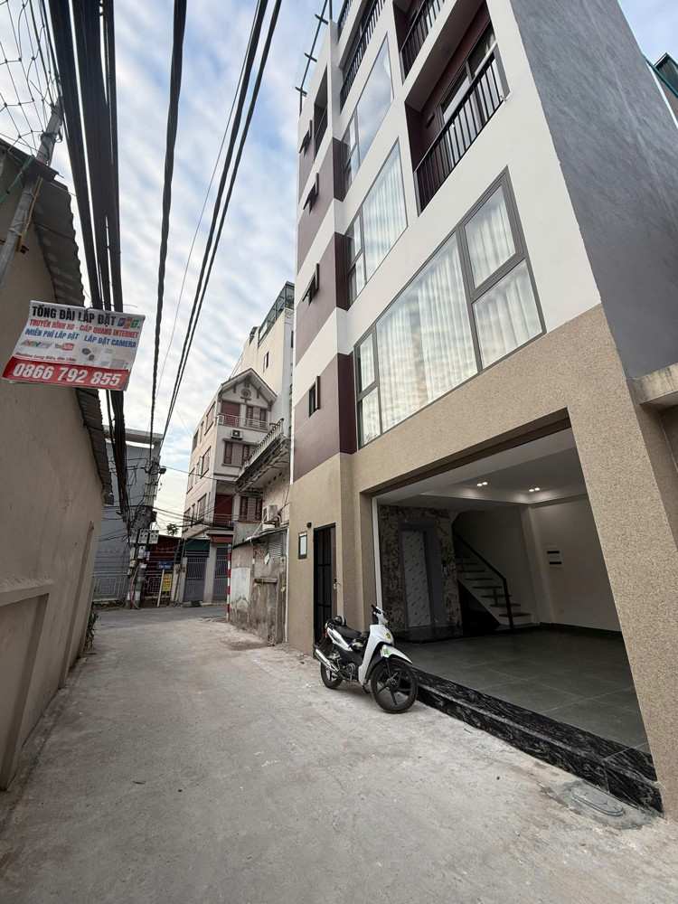 BÁN NHÀ MƯỚI Ô TÔ ĐỖ CỬA Tân Thụy 42m2 X 6 Tầng mặt tiền 7.6m, 15.2 tỷ Long Biên