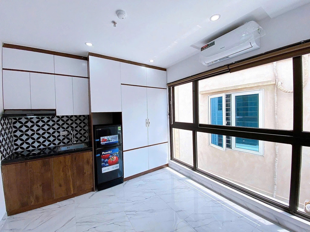 BÁN TÒA NHÀ DÒNG TIỀN TRUNG LIỆT, ĐỐNG ĐA - 51/56M x 7T THANG MÁY - MT 4.6M - Ô TÔ ĐỖ CỬA - GIÁ