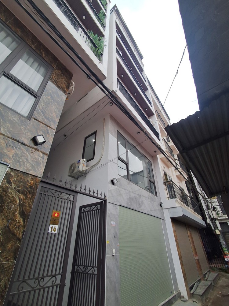 BÁN NHÀ 6 TẦNG THANG MÁY – ĐÀM QUANG TRUNG