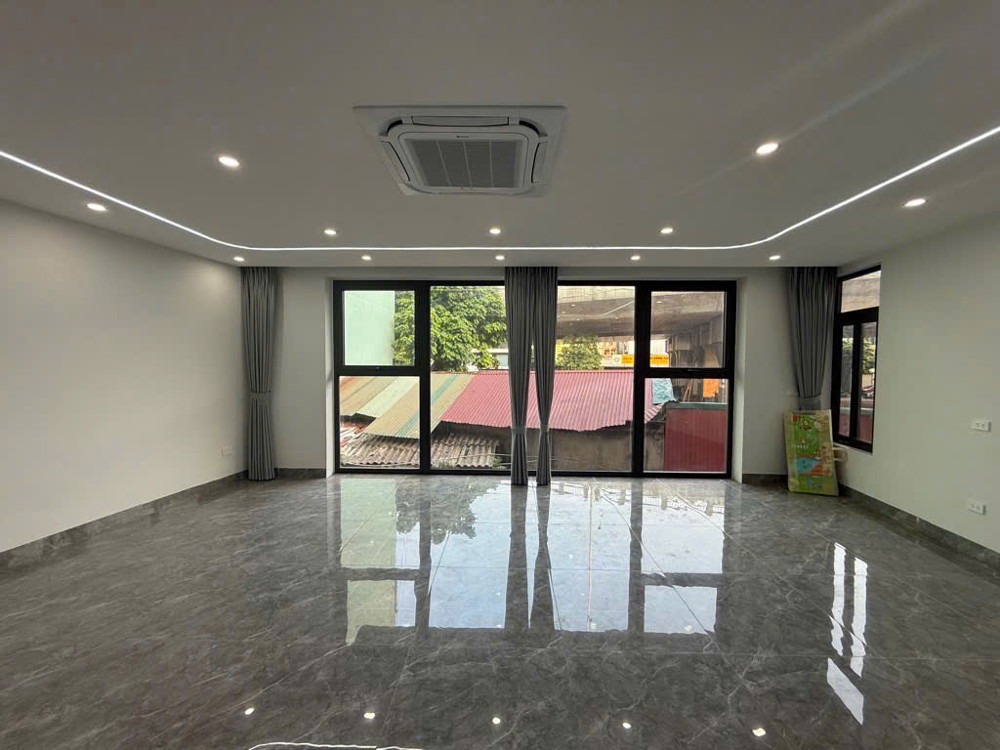 BÁN TÒA NHÀ 7 TẦNG – LÔ GÓC 2 MẶT TIỀN – ĐƯỜNG ĐÀM QUANG TRUNG, LONG BIÊN