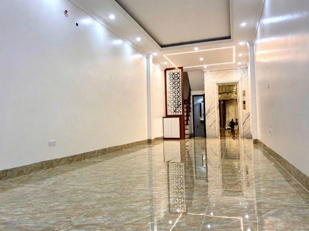 trần quốc vượng 48m x7 tầng thang máy 15,5 tỷ ngõ thông,rộng,gần phố,gần ô tô