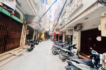 Nhà Đê La Thành - Đống Đa: 7 Tầng, Thang Máy, Kinh Doanh Sầm Uất - Giá 16.76 Tỷ