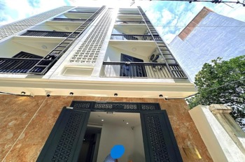 Phú Mỹ Tòa 6 Tầng, Thang Máy, 10 Phòng, KD 50tr/tháng - Giá 12.65 tỷ