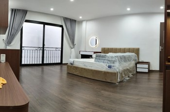 Bán Nhà Đội Cấn 39m2 7 tầng. mặt tiền 4.8m. giá 12 Tỷ Ba Đình Hà Nội