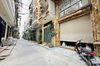 BÁN NHÀ TRẦN QUỐC HOÀN CẦU GIẤY PHÂN LÔ Ô TÔ VÀO NHÀ 2 THOÁNG 7 TẦNG THANG MÁY 21 TỶ