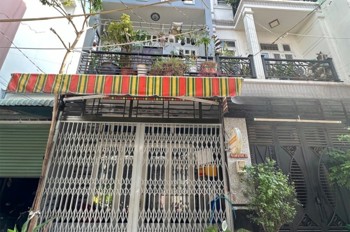Bán nhà mặt phố Lê Văn Quới, Bình Tân. DT 4x12m, 2 tầng, 2PN. Sổ hồng, giá 4.6 tỷ. LH: 0909898125
