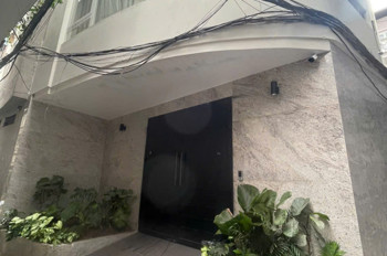 Giảm 3 tỷ cần bán toà nhà dòng tiền 318 La Thành thông sang Hào Nam 11 CHDV cao cấp cho thuê 1,2 tỷ/