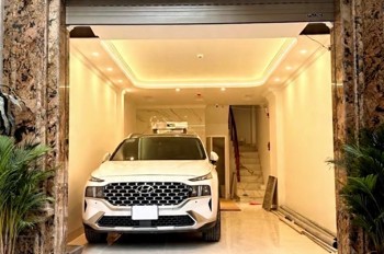 trần quốc hoàn 40m x7 tầng thang máy 21,7 tỷ- phân lô-gara ô tô,vỉa hè-20m ra phố